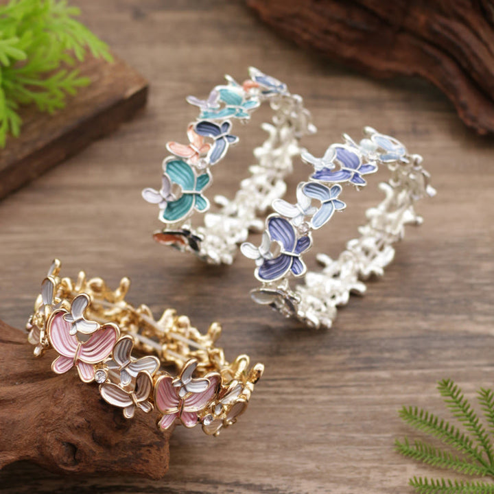 Pulsera elástica de aleación con diseño de mariposas coloridas y Buddha Stones