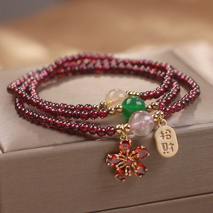 Pulsera multicapa con cuentas de Buddha Stones ultrafinas naturales de 3 mm y flor de cerezo para atraer la fortuna y protegerla.