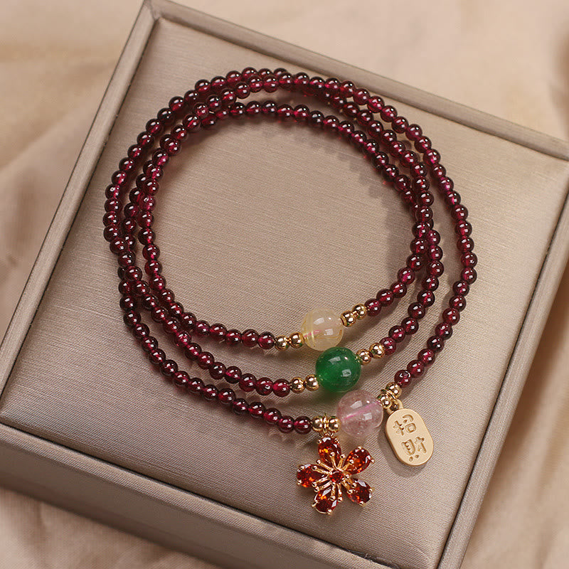 Pulsera multicapa con cuentas de Buddha Stones ultrafinas naturales de 3 mm y flor de cerezo para atraer la fortuna y protegerla.