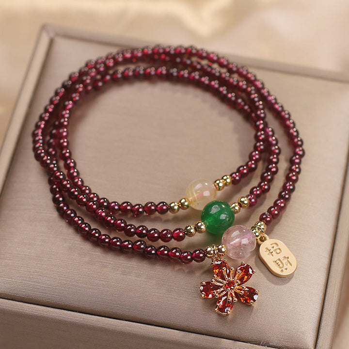 Pulsera multicapa con cuentas de Buddha Stones ultrafinas naturales de 3 mm y flor de cerezo para atraer la fortuna y protegerla.