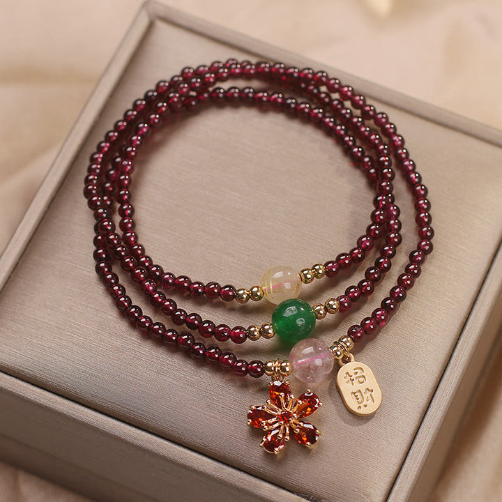 Pulsera multicapa con cuentas de Buddha Stones ultrafinas naturales de 3 mm y flor de cerezo para atraer la fortuna y protegerla.