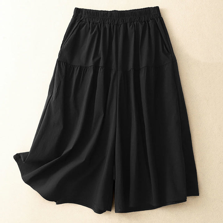 Pantalones casuales sueltos y lisos de algodón elástico para mujer, de Buddha Stones, con pernera ancha y bolsillos, de 7-8 de largo.