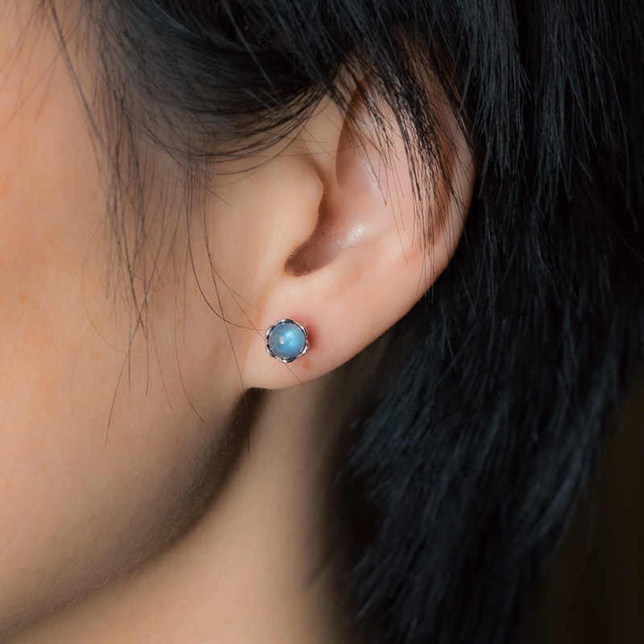 Pendientes de piedra lunar con diseño positivo de Buddha Stones en plata de ley 925