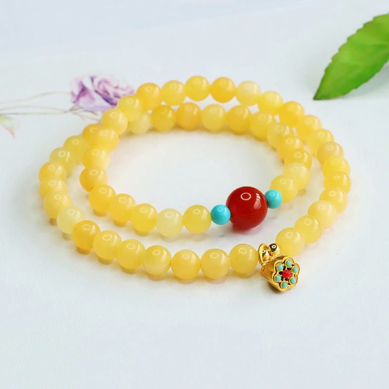 Pulsera de la fortuna con cuentas de ágata roja y topacio de Buddha Stones