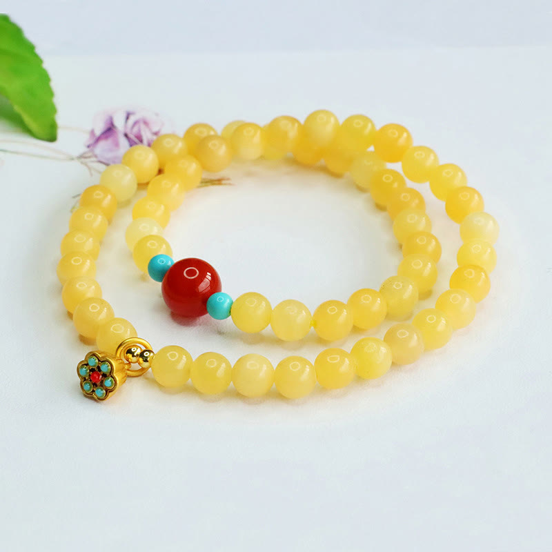 Pulsera de la fortuna con cuentas de ágata roja y topacio de Buddha Stones
