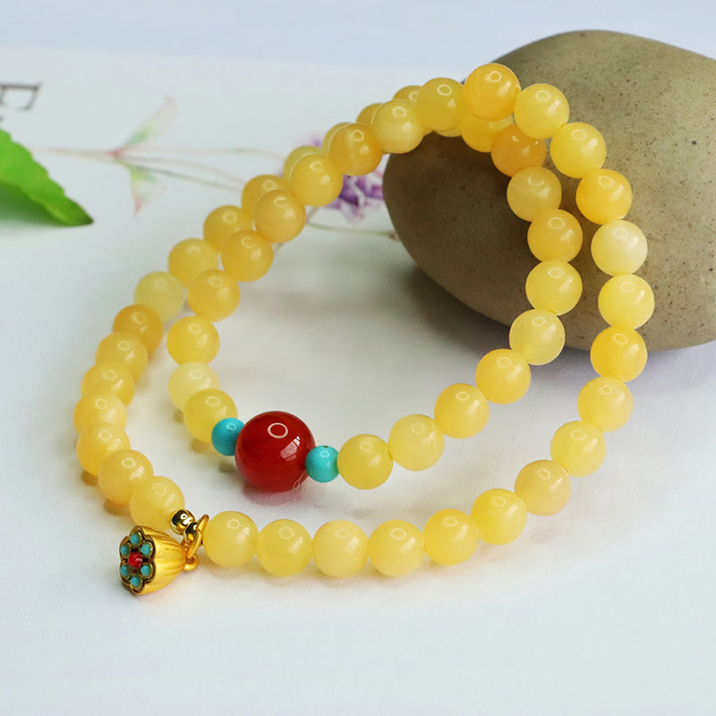 Pulsera de la fortuna con cuentas de ágata roja y topacio de Buddha Stones