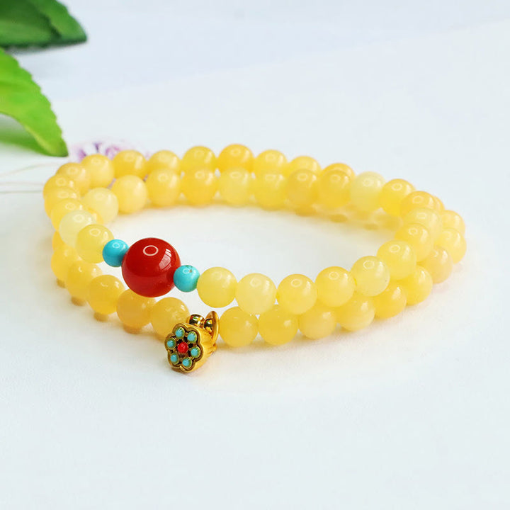 Pulsera de la fortuna con cuentas de ágata roja y topacio de Buddha Stones