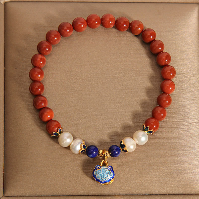 Pulsera con dije de candado de paz y ágata roja natural del sur de Buddha Stones