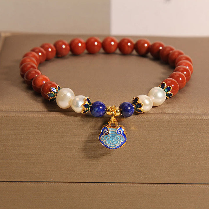 Pulsera con dije de candado de paz y ágata roja natural del sur de Buddha Stones