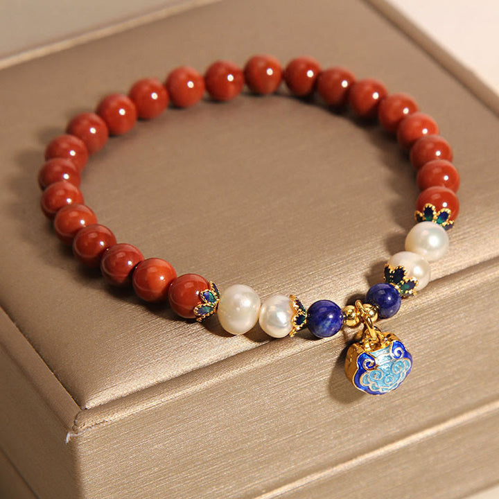 Pulsera con dije de candado de paz y ágata roja natural del sur de Buddha Stones
