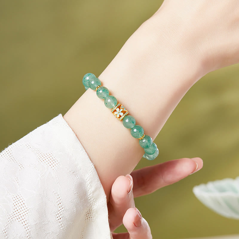 Pulsera Buddha Stones de plata de ley 925 con cuarzo fresa verde y flor de la calma