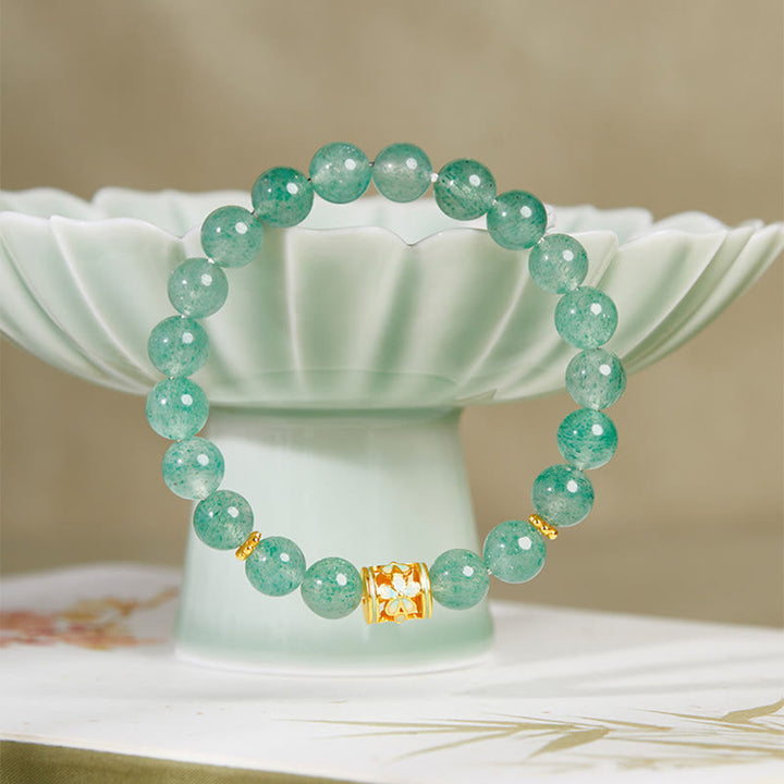 Pulsera Buddha Stones de plata de ley 925 con cuarzo fresa verde y flor de la calma