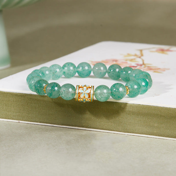 Pulsera Buddha Stones de plata de ley 925 con cuarzo fresa verde y flor de la calma