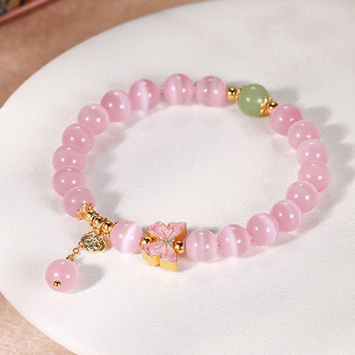 Pulsera de la paz con dije de mariposa de jade hetiano y ojo de gato en plata de ley 925 con Buddha Stones
