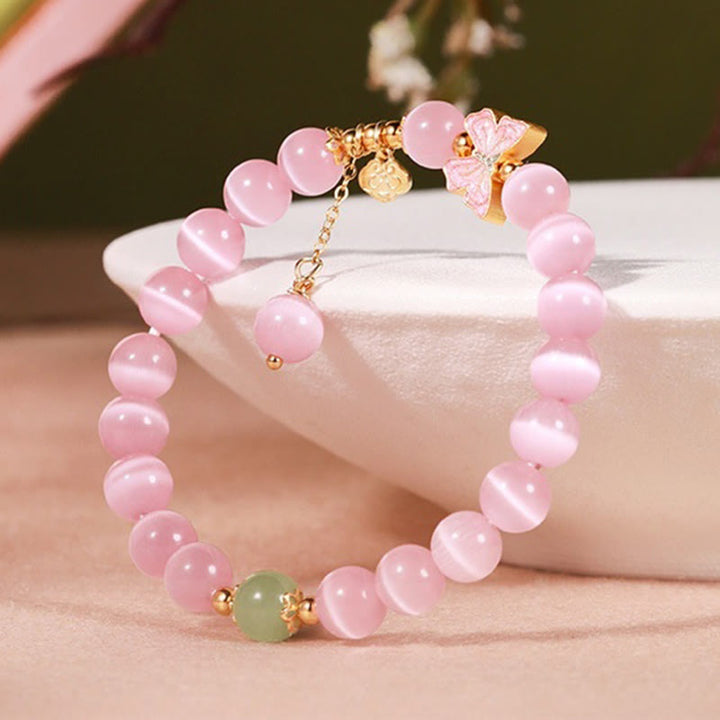Pulsera de la paz con dije de mariposa de jade hetiano y ojo de gato en plata de ley 925 con Buddha Stones
