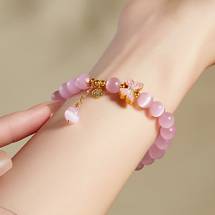 Pulsera de la paz con dije de mariposa de jade hetiano y ojo de gato en plata de ley 925 con Buddha Stones