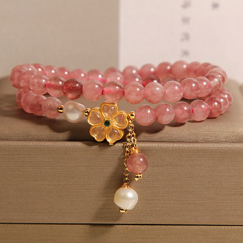 Pulsera positiva con diseño de trébol de cuatro hojas y cuarzo fresa de Buddha Stones
