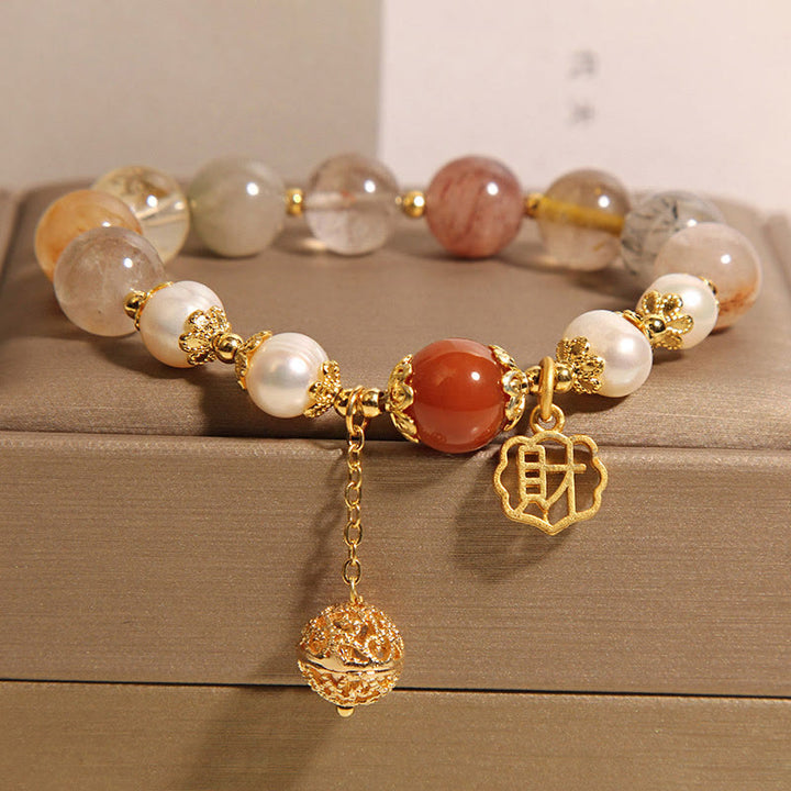 Pulsera de perlas de cuarzo rutilado natural Buddha Stones para atraer la fortuna y la riqueza