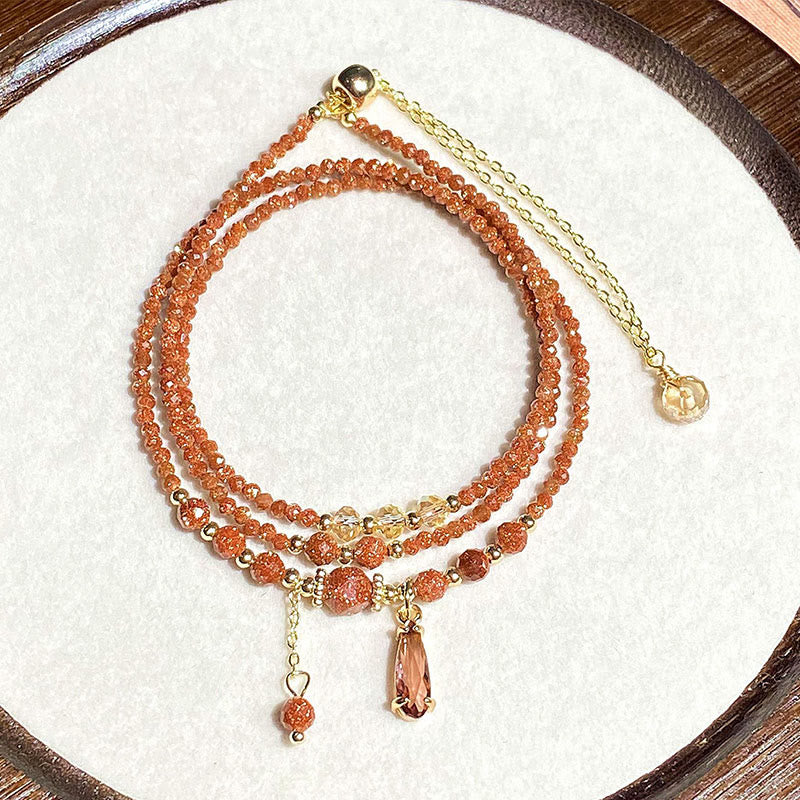 Pulsera multicapa positiva con cuentas de piedra dorada naturales de 2 mm de Buddha Stones