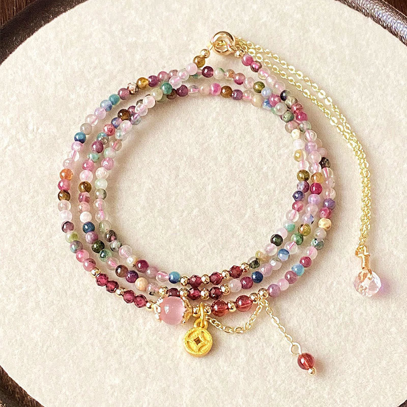 Pulsera de la sabiduría con monedas de turmalina de colores y cuentas irregulares de 2,5 mm de Buddha Stones