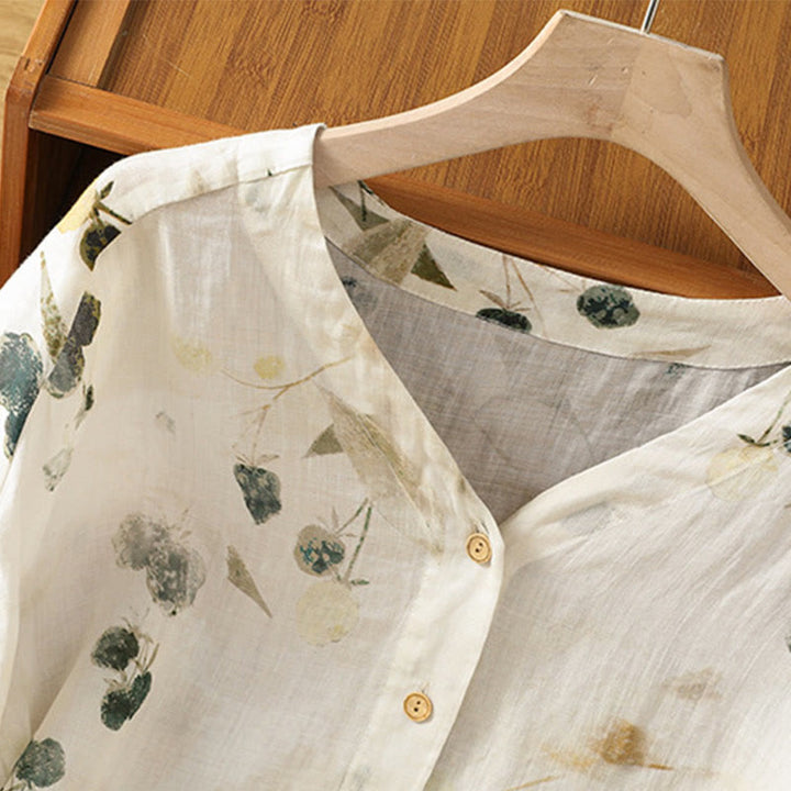 Camisa de mujer de poliéster con cuello en V y diseño de botones, estampada con Buddha Stones y plantas. - image 3