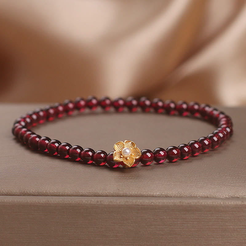 Pulsera de granate natural de 4 mm con Buddha Stones y flor de la pasión