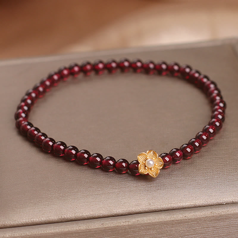 Pulsera de granate natural de 4 mm con Buddha Stones y flor de la pasión