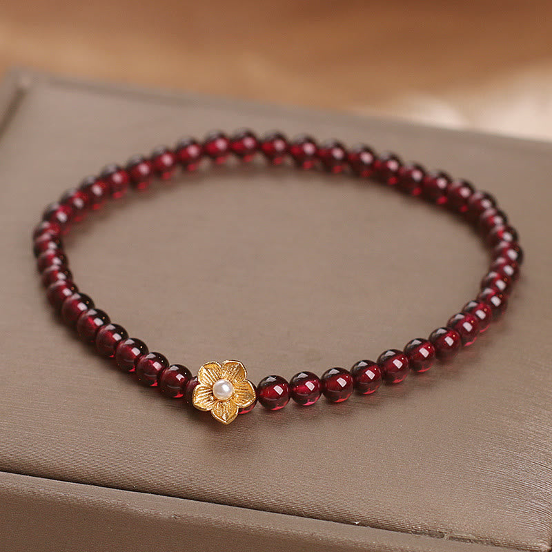 Pulsera de granate natural de 4 mm con Buddha Stones y flor de la pasión