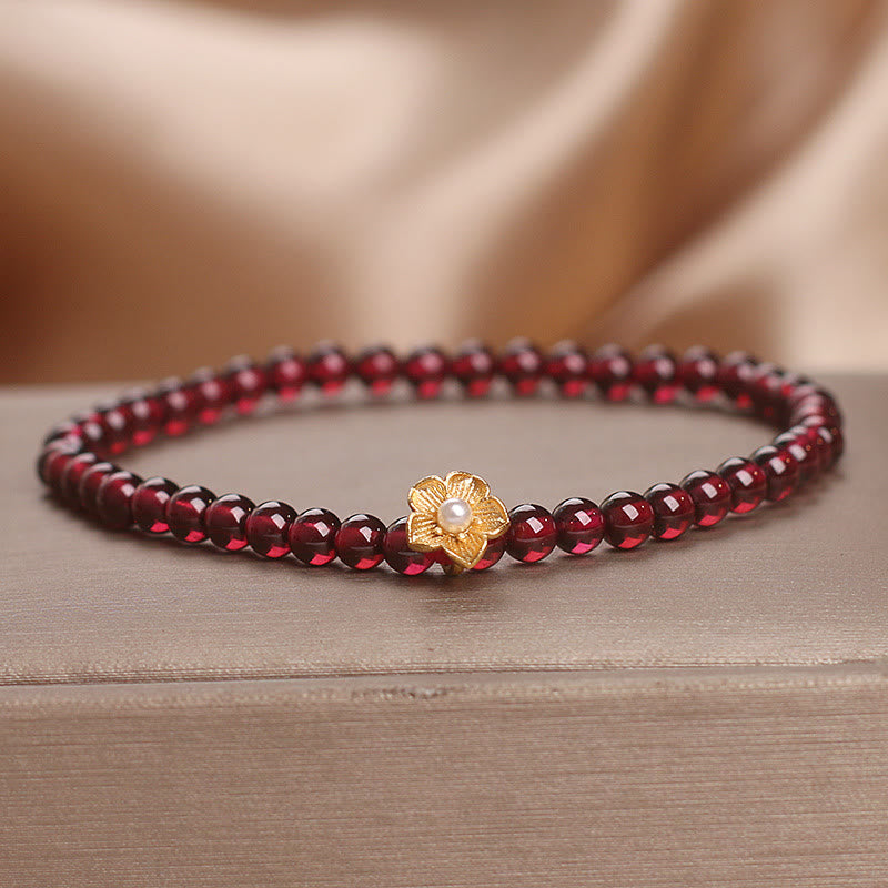 Pulsera de granate natural de 4 mm con Buddha Stones y flor de la pasión