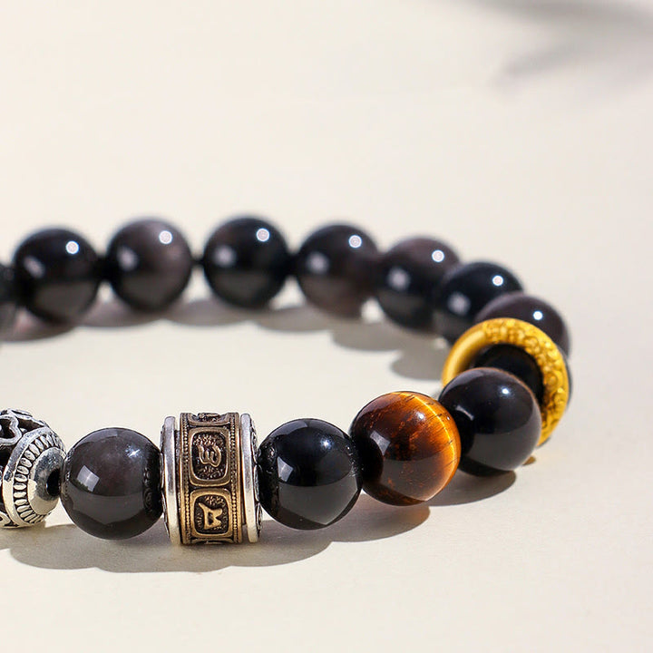 Pulsera de protección Om Mani Padme Hum con obsidiana, ojo de tigre y Buddha Stones con brillo plateado