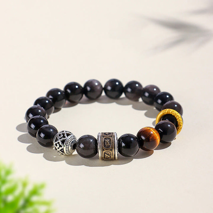 Pulsera de protección Om Mani Padme Hum con obsidiana, ojo de tigre y Buddha Stones con brillo plateado