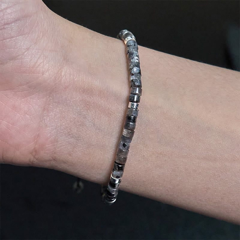 Pulsera de cuentas espaciadoras con coraje y piedras naturales negras brillantes de Buddha Stones