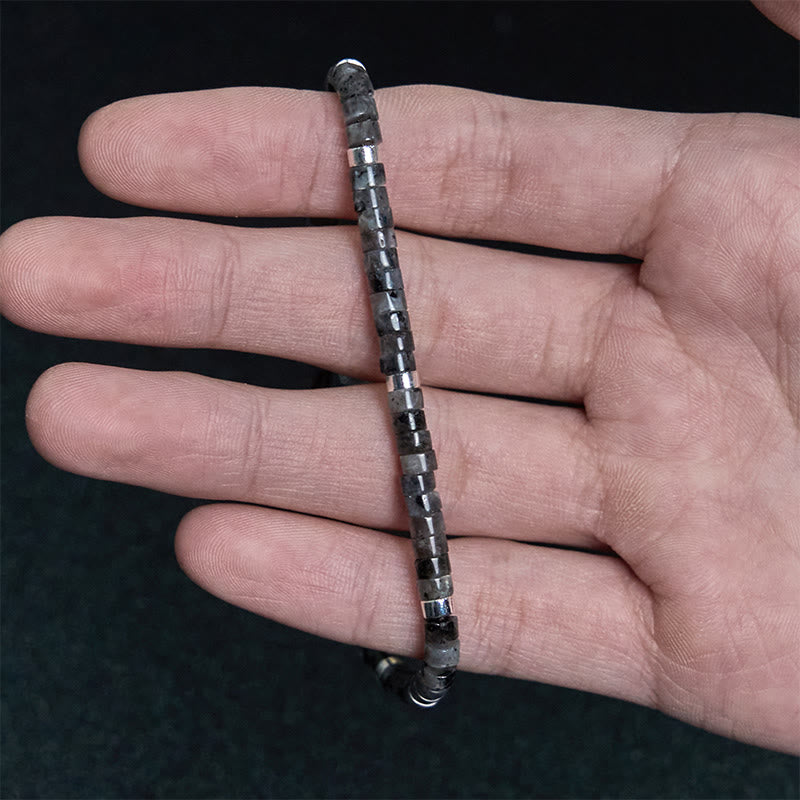 Pulsera de cuentas espaciadoras con coraje y piedras naturales negras brillantes de Buddha Stones