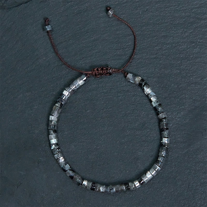 Pulsera de cuentas espaciadoras con coraje y piedras naturales negras brillantes de Buddha Stones