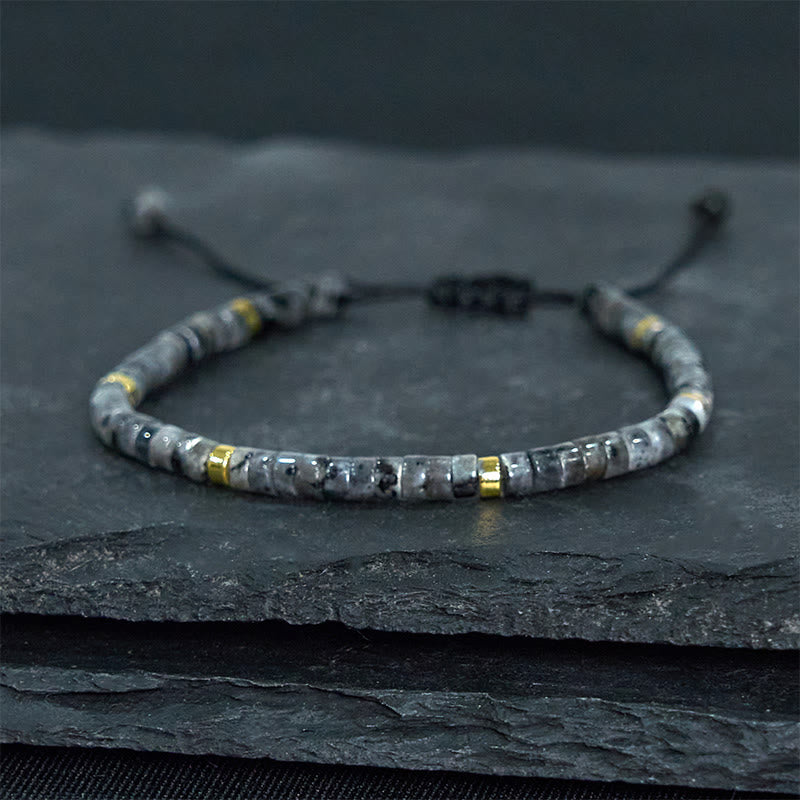 Pulsera de cuentas espaciadoras con coraje y piedras naturales negras brillantes de Buddha Stones