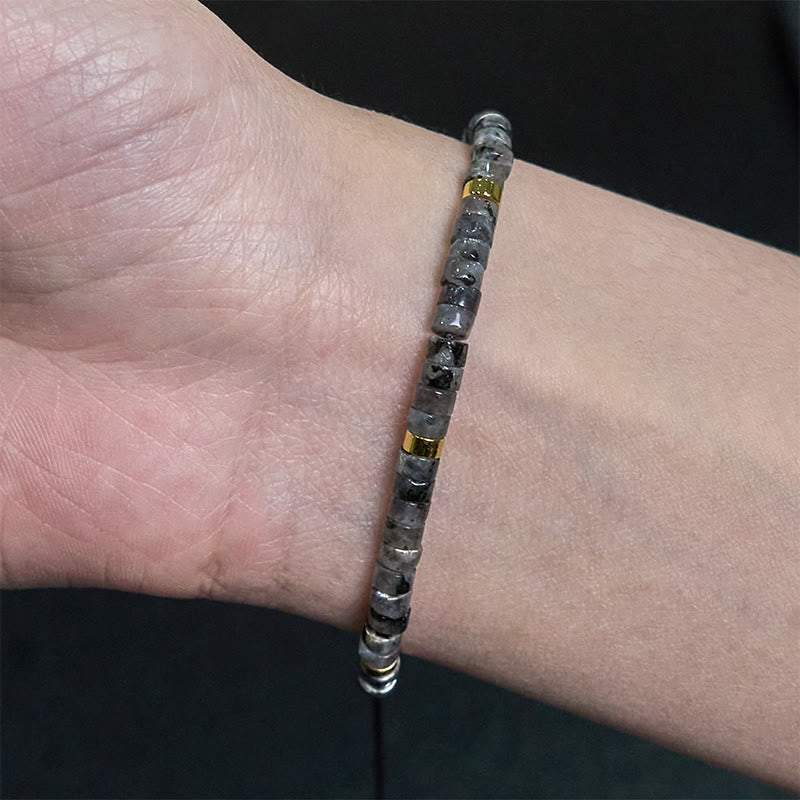 Pulsera de cuentas espaciadoras con coraje y piedras naturales negras brillantes de Buddha Stones