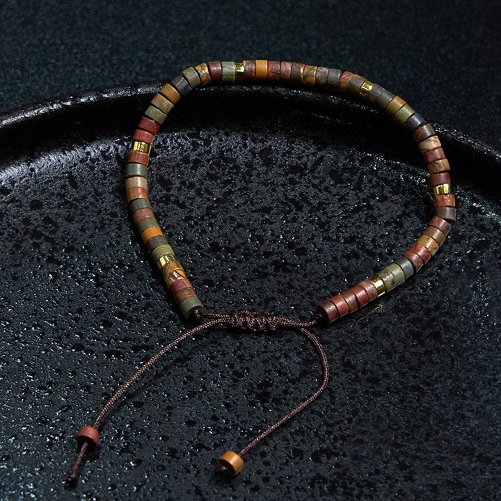 Pulsera de cuentas espaciadoras de rodonita y Buddha Stones para sanar relaciones
