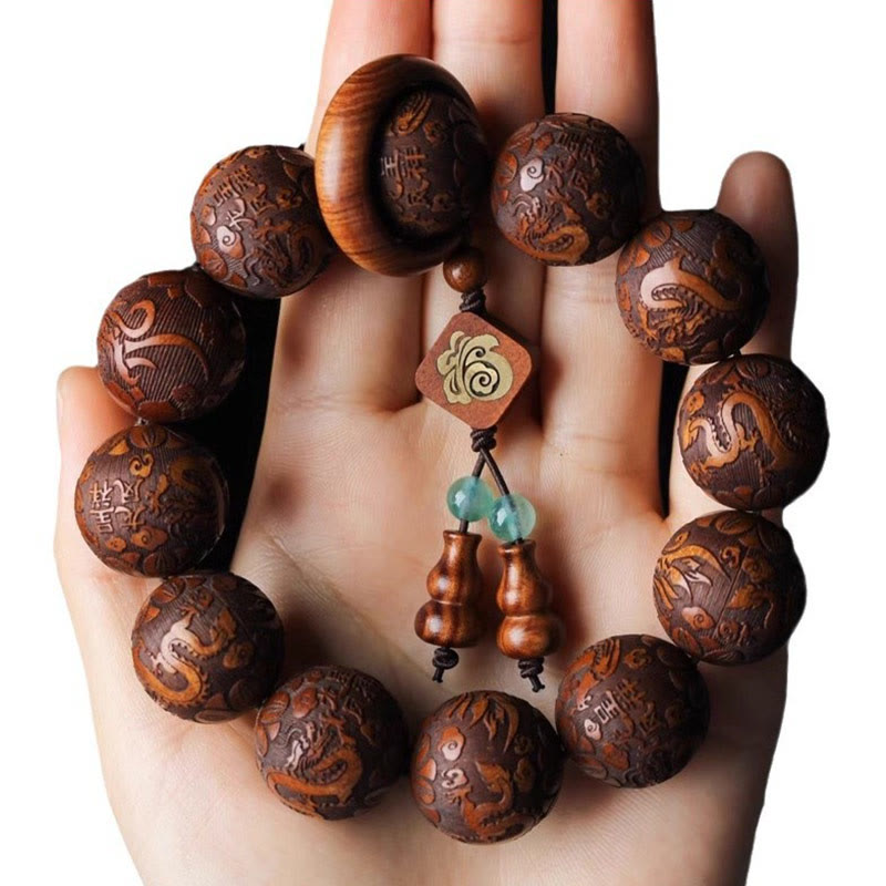 Pulsera cálida con cuentas de palisandro y calabaza con talla natural de dragón y fénix Fu