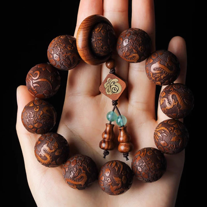 Pulsera cálida con cuentas de palisandro y calabaza con talla natural de dragón y fénix Fu