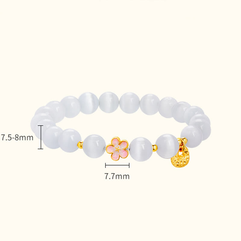 Pulsera con Buddha Stones en plata de ley 925 con ojo de gato blanco y flor de melocotón natural