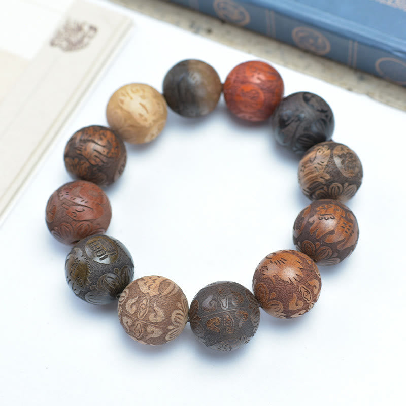 Pulsera curativa con Buddha Stones talladas en sándalo, símbolo del zodíaco chino, dragón auspicioso, fénix y Fu.