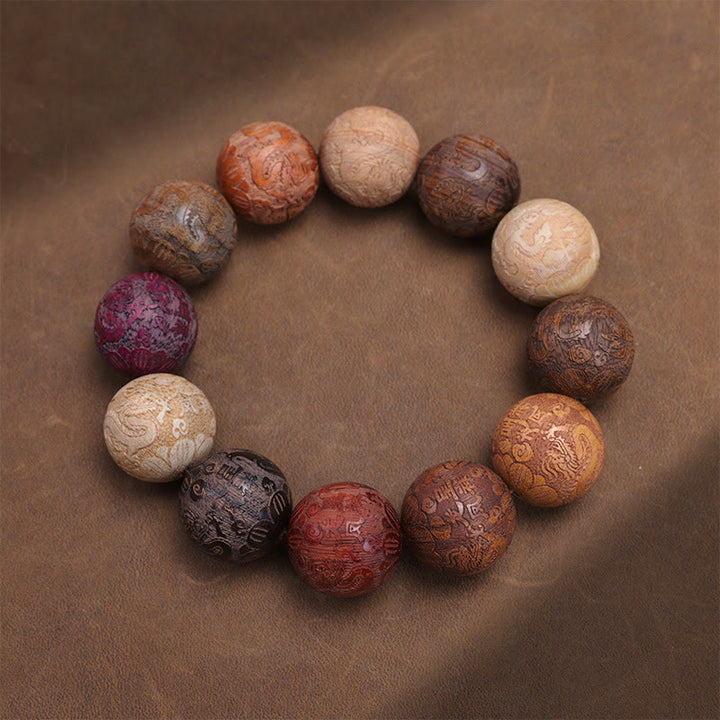 Pulsera curativa con Buddha Stones talladas en sándalo, símbolo del zodíaco chino, dragón auspicioso, fénix y Fu.