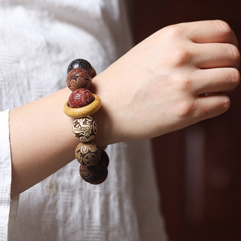 Pulsera curativa con Buddha Stones talladas en sándalo, símbolo del zodíaco chino, dragón auspicioso, fénix y Fu.