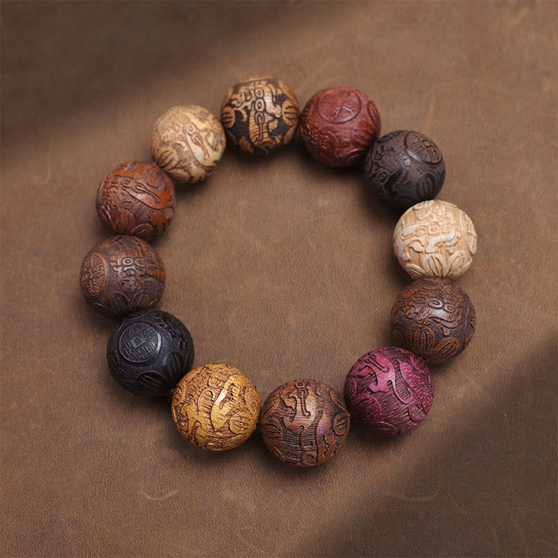 Pulsera curativa con Buddha Stones talladas en sándalo, símbolo del zodíaco chino, dragón auspicioso, fénix y Fu.