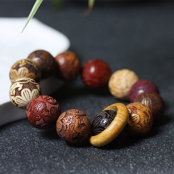 Pulsera curativa con Buddha Stones talladas en sándalo, símbolo del zodíaco chino, dragón auspicioso, fénix y Fu.