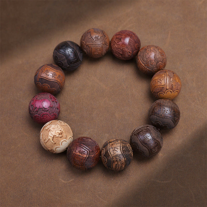 Pulsera curativa con Buddha Stones talladas en sándalo, símbolo del zodíaco chino, dragón auspicioso, fénix y Fu.