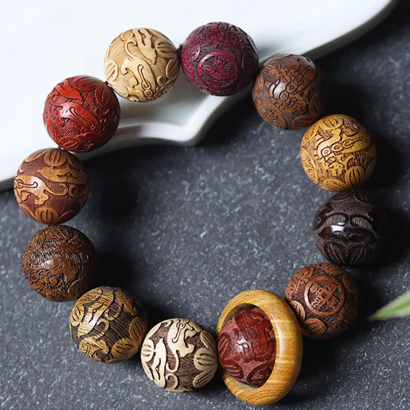 Pulsera curativa con Buddha Stones talladas en sándalo, símbolo del zodíaco chino, dragón auspicioso, fénix y Fu.