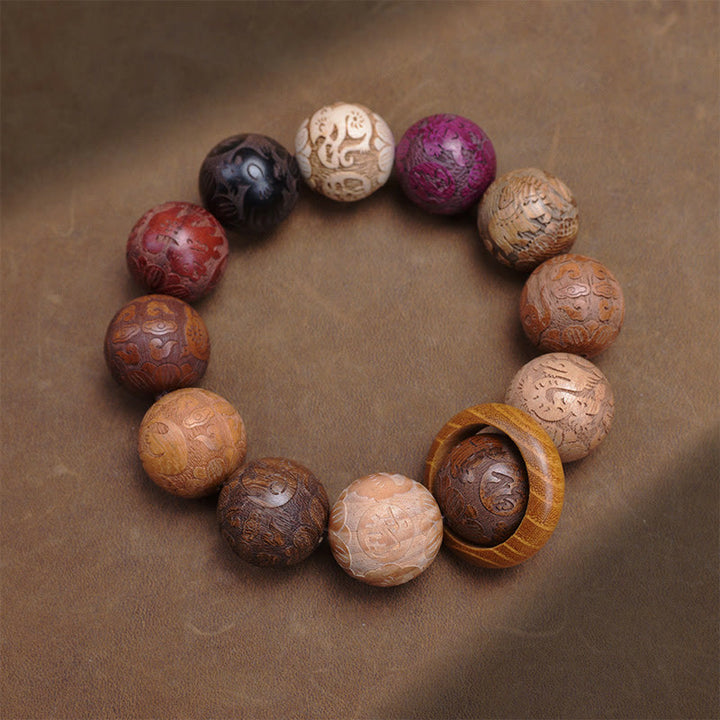 Pulsera curativa con Buddha Stones talladas en sándalo, símbolo del zodíaco chino, dragón auspicioso, fénix y Fu.