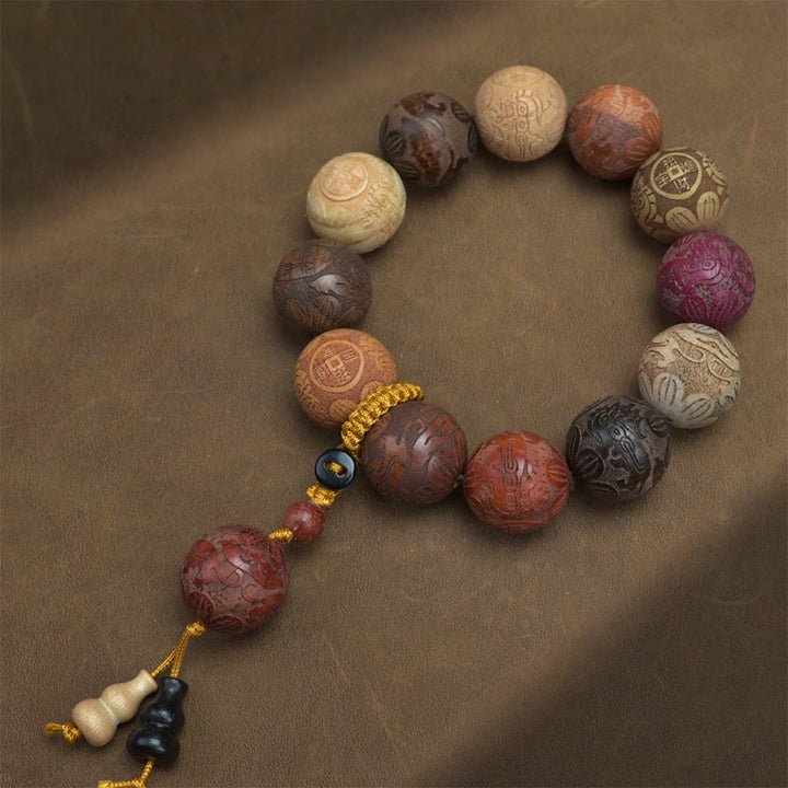 Pulsera curativa con Buddha Stones talladas en sándalo, símbolo del zodíaco chino, dragón auspicioso, fénix y Fu.