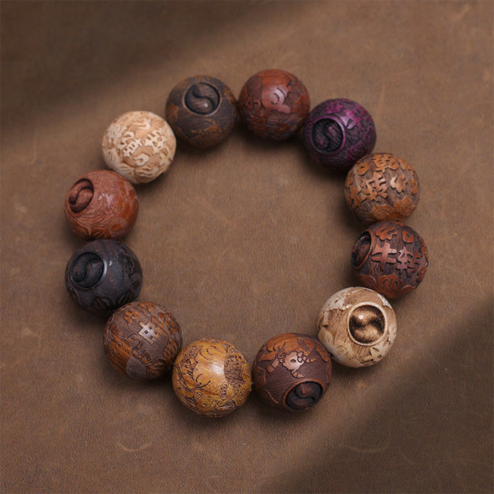 Pulsera curativa con Buddha Stones talladas en sándalo, símbolo del zodíaco chino, dragón auspicioso, fénix y Fu.